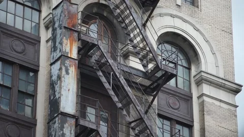 Rusty fire escape in city Stock Footage 188935911