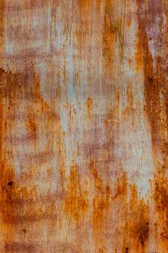Rusty flat metal surface with corrosion in outdoor industrial setting Stock Photos