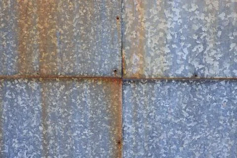 Rusty galvanized metal plates texture with rivets Stock Photos