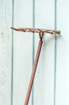 Rusty garden rake Stock Photos