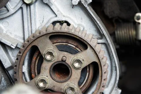 A rusty gear is shown in a close up Stock Photos