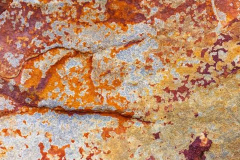 Rusty grunge texture on large stone 스톡 사진