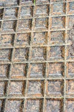 Rusty gully cover close up Stock Photos