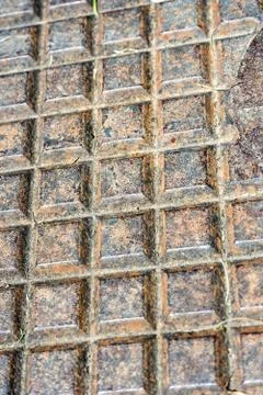 Rusty gully cover close up Stock Photos