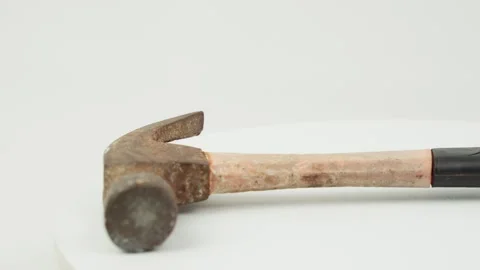 Rusty Hammer Rotating on Clean White Background Stock Footage 324911931