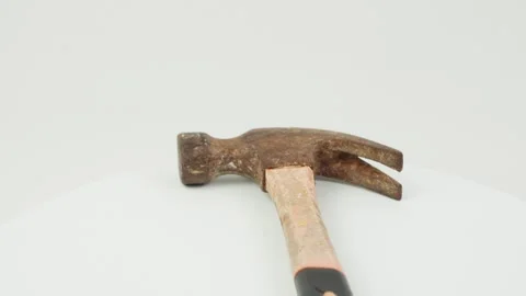 Rusty Hammer Rotating on Clean White Background Stock Footage 324911952