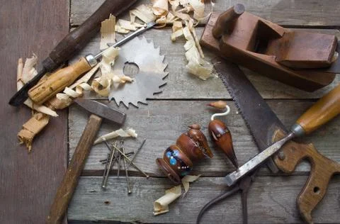 Rusty hand tools table upper view. Stock Photos