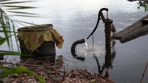 Rusty hand water pump Stock Footage 320006487