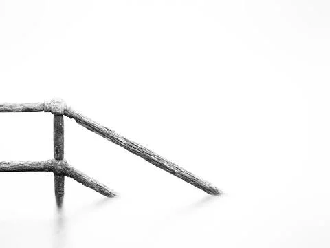 Rusty handrail going down on water Stock Photos