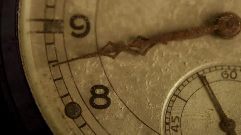 Rusty hands of vintage watch move past number eight Video stock 329597928