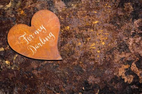 Rusty heart on rusty background, text for my darling 写真素材
