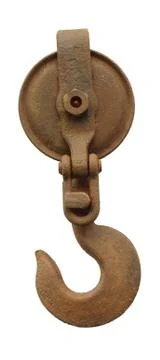Rusty hook and pulley isolated on white Stock Photos