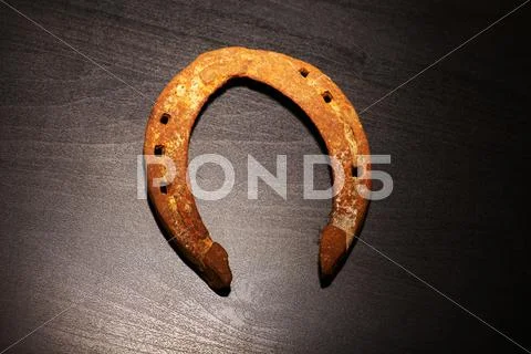 Rusty horse shoe Stock Photos