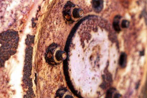 Rusty hub of tractor wheel close up background - horizontal Stock Photos