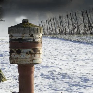 Rusty hydrant with snow Stock Photos