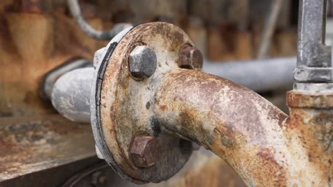 Rusty industrial engine pipe connection showing corrosion and age on metal Stock Footage 332615319