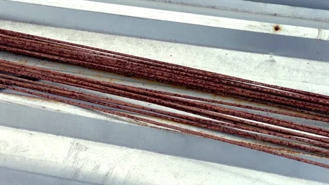 Rusty iron bars on metal surface Vídeo Stock 339537464