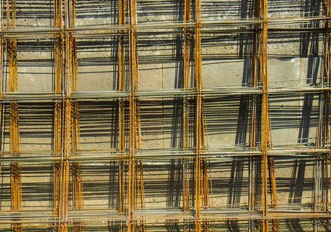 Rusty iron grid on the wall, wallpaper of iron grid Stock Photos