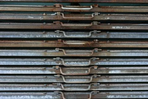 Rusty iron metal plates front view with handle Stock Photos