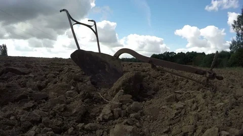 Rusty iron plough in the field, time lapse 4K Stock Footage 69791265