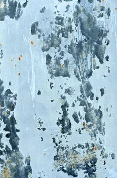 Rusty iron surface with damaged blue paint. Stock Photos