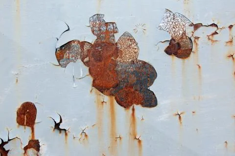 Rusty iron surface with peeling paint - grunge texture Stock Photos