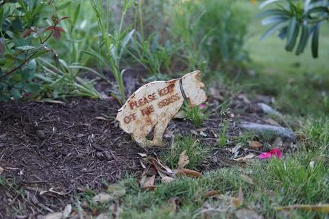 Rusty Keep off the Grass Sign 写真素材