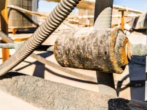 Rusty leaking pipe of air conditioning Stock Photos