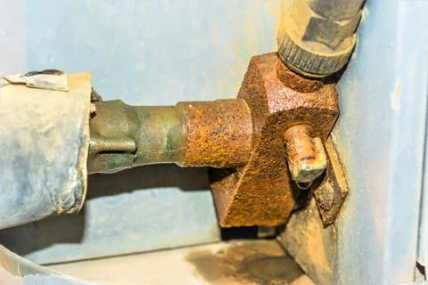 Rusty leaking pipe of air conditioning Stock Photos