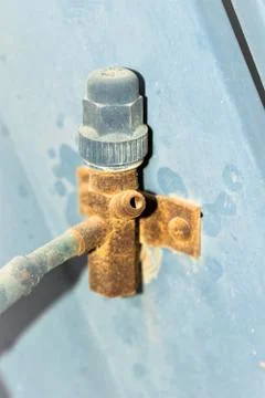 Rusty leaking pipe of air conditioning Stock Photos