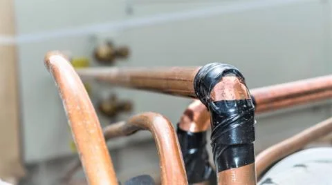 Rusty leaking pipe of air conditioning Stock Photos