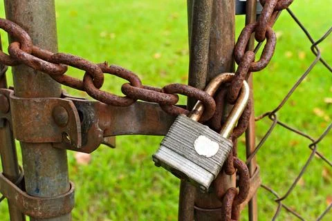 Rusty Lock and Chain on Gate Stock Photos