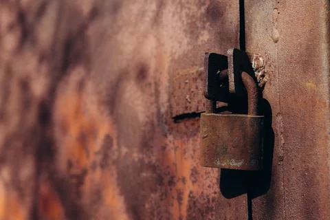 A rusty lock on the door Stock Photos