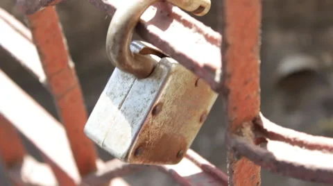 Rusty lock hanging Stock Footage 54204042