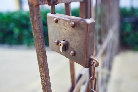 Rusty lock on iron door Stock Photos