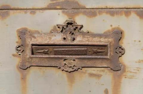 Rusty mail slot Fotos de archivo