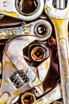 Rusty mechanic tools with grease stains Stock Photos