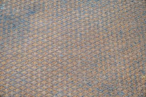 Rusty metal background with rhombus pattern Stock Photos