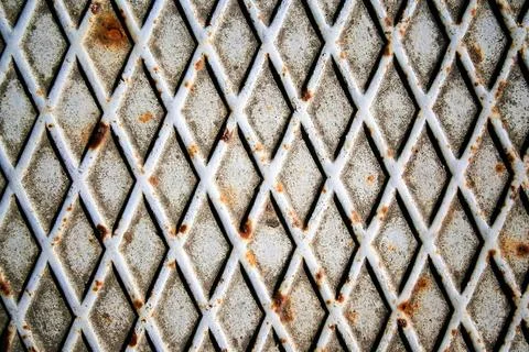 Rusty metal background with rhombus pattern Stock Photos