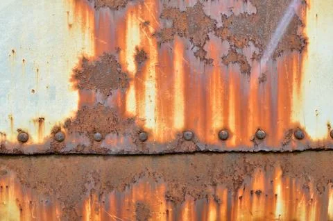 Rusty metal background with streaks of rust. Rust stains. Stock Photos