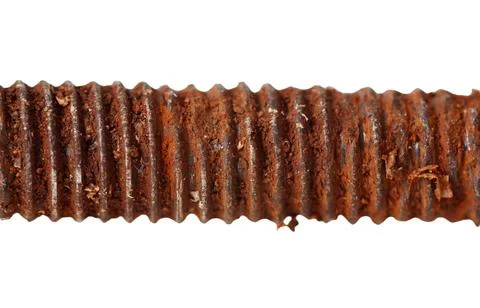 A rusty metal bolt with a spiral pattern 写真素材