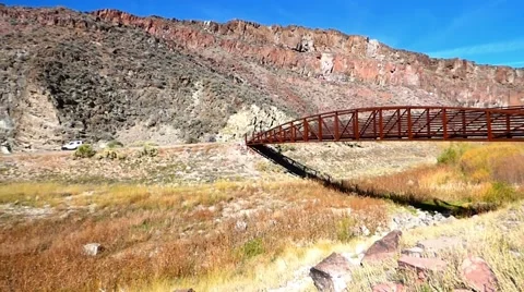 Rusty Metal Bridge Spanning a High Desert Canyon Video stock 47474703