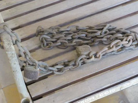 A rusty metal chain on a bed Stock Photos