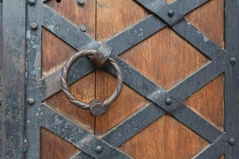 Rusty metal cloud of ancient doors. Vintage Stock Photos