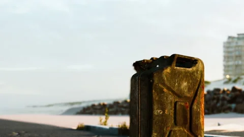 Rusty metal container sits on the beach during early morning light Stock Footage 340231920