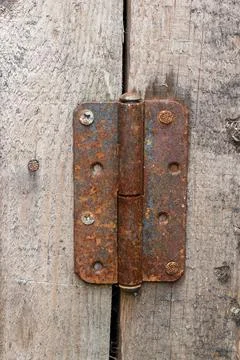 Rusty metal door hinge. Stock Photos