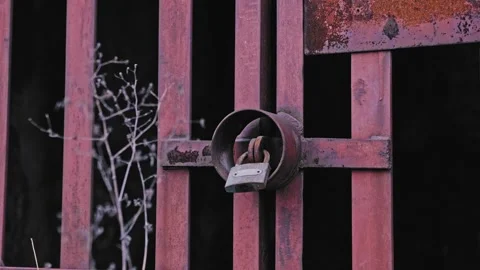Rusty Metal Gate Secured With Old Padlock Stock Footage 266782705