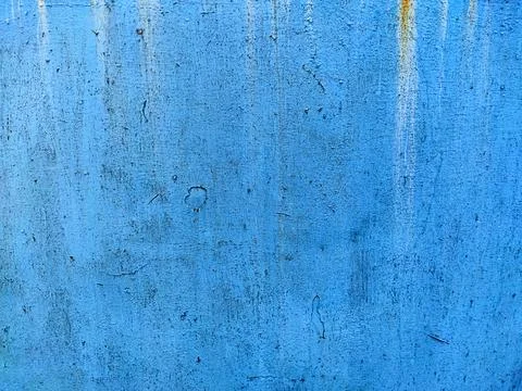 Rusty metal panel with cracked blue paint, corroded grunge metal background Stock Photos