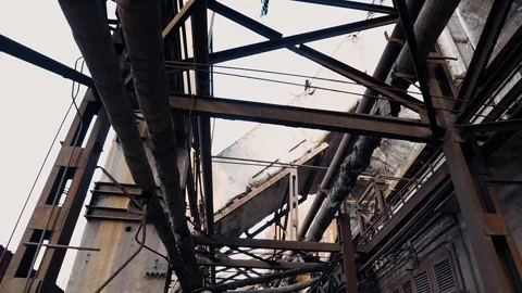 Rusty metal pipes, structures in an abandoned factory. 스톡 동영상 222943434