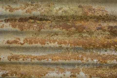 Rusty metal sheet. deep rust on metal. yellow-brown rust on a gray metallic s Foto stock